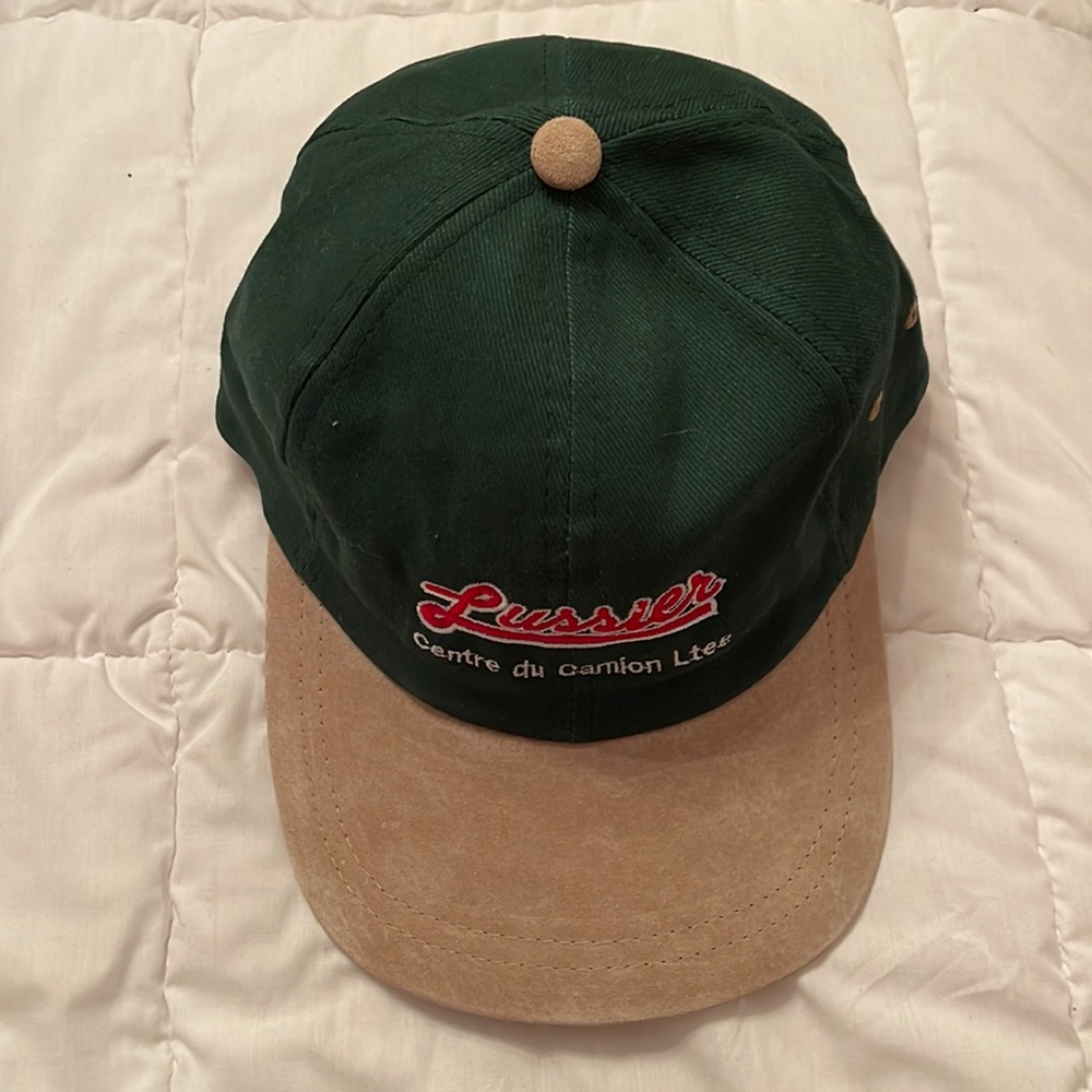 Unisex trucker cap. Forest green and tan suede visor